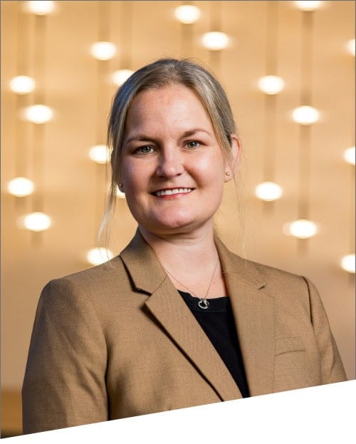 Smiling person in a professional setting.