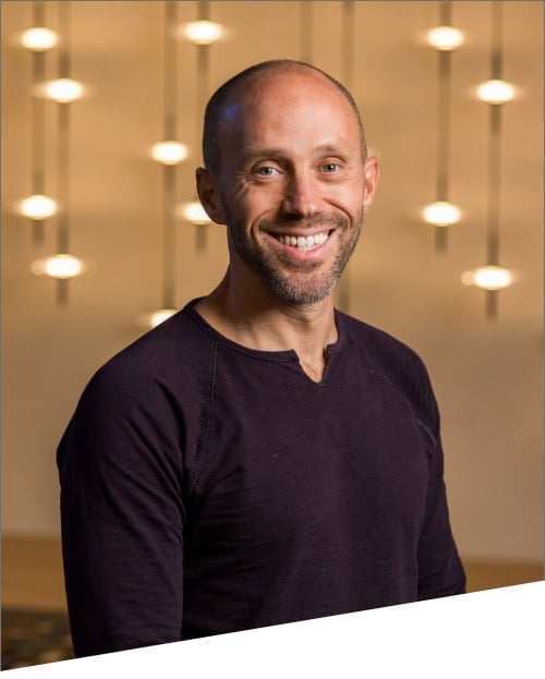 Smiling man with blurred light background