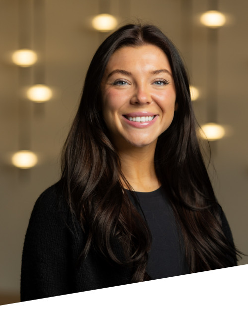 Smiling woman with blurred lights background