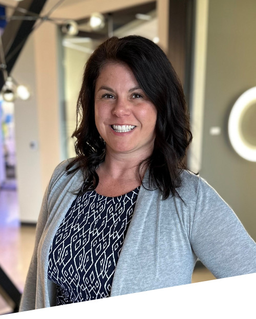 Smiling woman in office environment