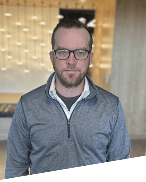 Man with glasses in office setting